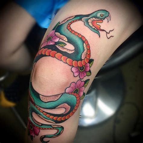 snake wrapped around leg tattoo|Unique Snake Wrapped Leg Tattoo Designs